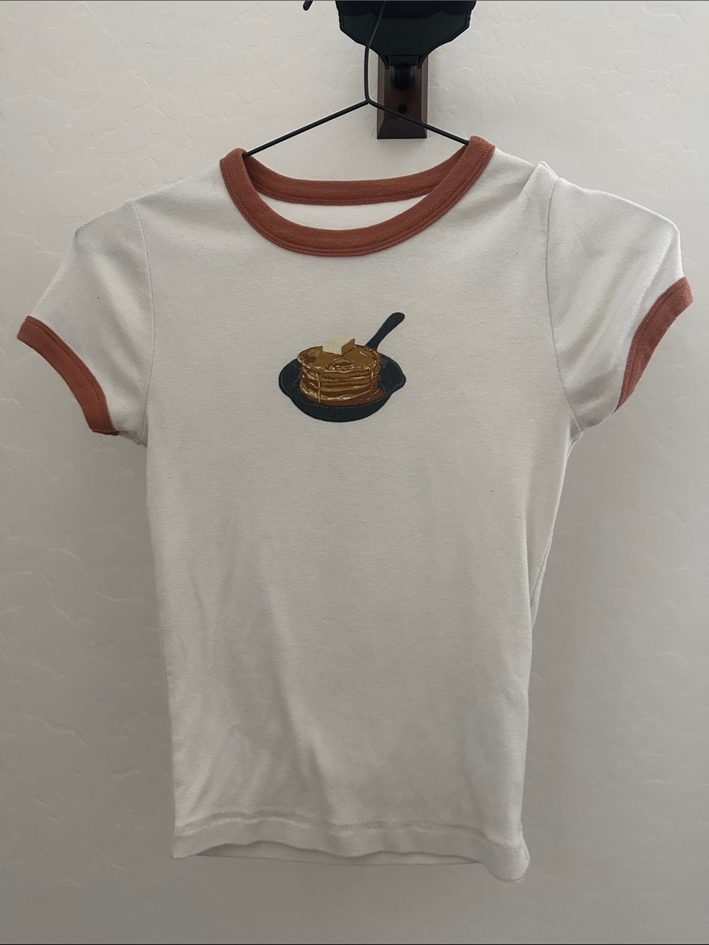 Kimchi Blue White Ringer Tee with Rust Trim & Pancake Skillet Graphic